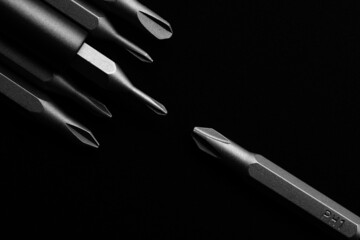 Screwdriver tips different shapes and sizes close up. Manual metal mini screwdriver and set of the...