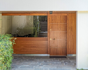 modern residential apartments building wood and glass entrance, Athens Greece