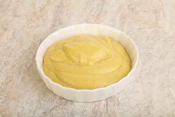 Organic mustard sauce in the bowl