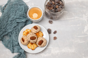 coconut and almond cookies on a small saucer