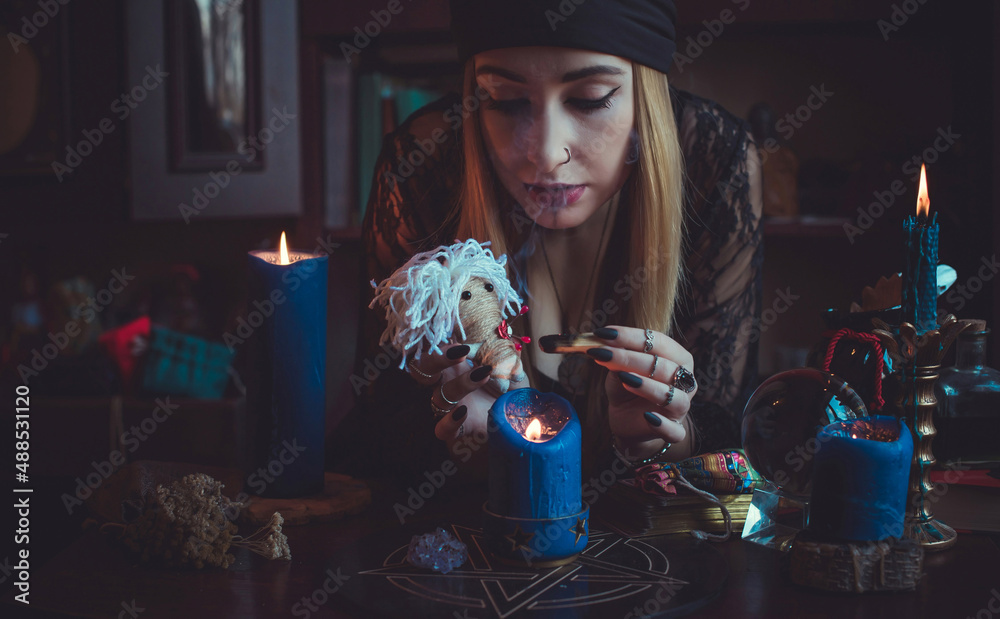 Wall mural concept of fortune telling and predictions of fate, magic and wicca elements on a table, witch look