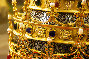 Golden crown with precious stones