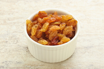 Sweet yellow raisin in the bowl
