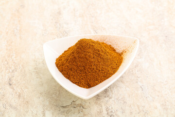 Dry Paprika powder in the bowl