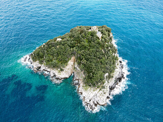 Aerial view of Bergeggi island, heart island from above, in Liguria, north Italy. Drone photography of the Ligurian coast, province of Savona with Spotorno and the island of Bergeggi.