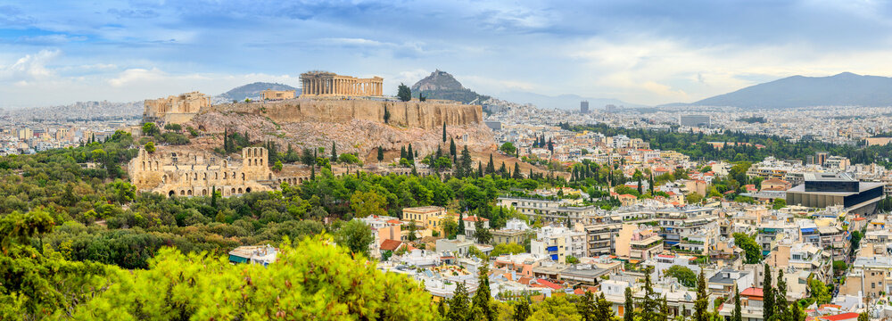 Panorama of Athens with Acropolis hill, Athens, Greece, Europe. The Old Acropolis is the main attraction of Athens. Picturesque view of the remains of the ancient city of Athens.
