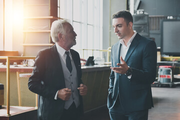 Business people discussing business project in office.