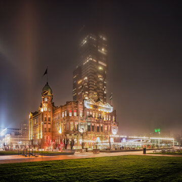 ROTTERDAM-JANUARY, 15, 2022. The iconic Hotel Ney York at twilight shrouded in mist. From here, in the past thousands of Dutch emigrants left for North America, persuing a better life.