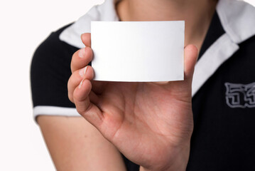 Obraz premium Young woman shows a credit card..
