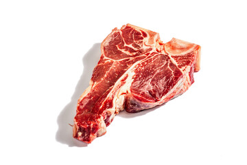 Classic T-bone steak isolated on white background. Hard light, dark shadow, mockup, template
