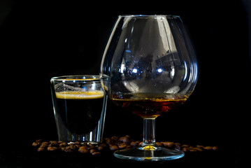 Den Helder, the Netherlands. January 2022. Close up of coffee, beans with cognac on black background.