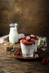 Yogurt dessert with granola and berries
