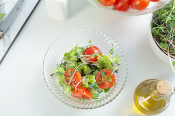 healthy vegetarian salad on white table