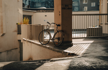 vintage old bicycle in front of a house in the sun