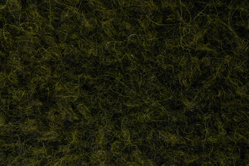 Fototapeta na wymiar Dark green wool texture closeup