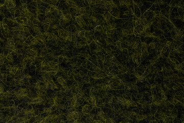Dark green wool texture closeup
