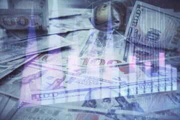 Multi exposure of forex chart drawing over us dollars bill background. Concept of financial success markets.