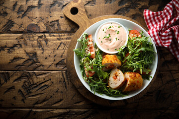 Homemade chicken rolls stuffed with cheese