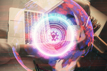 Fototapeta premium Double exposure of woman hands typing on computer and technology theme drawing. High Tech concept.
