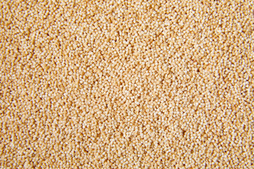 Flat lay macro natural dried amaranth seeds, top view