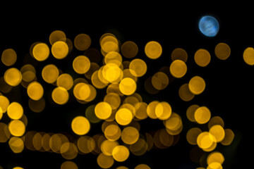 Elegant and romantic golden Christmas lights background with bokeh