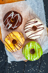 glazed donut on wood background.