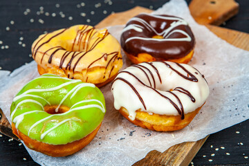glazed donut on wood background.