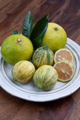 Fresh ripe bergamot citrus fruit and pink tiger lemons