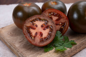 Healthy vegetarian food, reddish brown sweet kumato tomatoes
