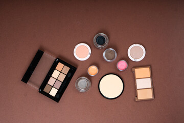 Group of cosmetic and makeup products on studio background