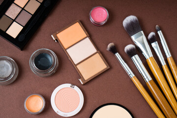Group of cosmetic and makeup products on studio background