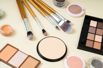 Group of cosmetic and makeup products on studio background