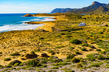 Coast view with camper rv camping on sea shore, Spain