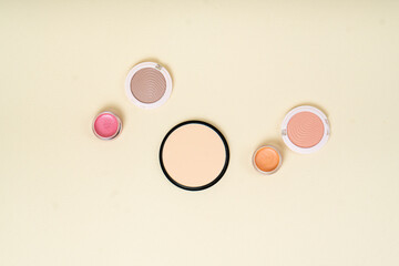 Group of cosmetic and makeup products on studio background