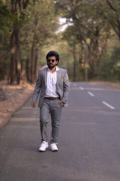 person walking on the road