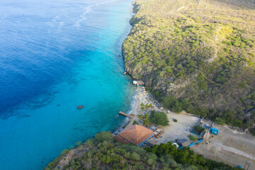 Aerial view of coast scenery with the ocean, cliff, and beach around Vaersenbaai area, Curacao,...