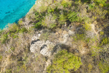 Aerial view of coast scenery with the ocean, cliff, and beach around Vaersenbaai area, Curacao,...