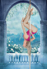Poledance blonde woman with long legs in a pink bikini poses beautifully on a pylon sports elements against the backdrop of a beautiful garden fairy tale