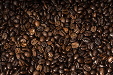 Roasted coffee consumers. Coffee objects are laid out on the surface. Food photo background.
