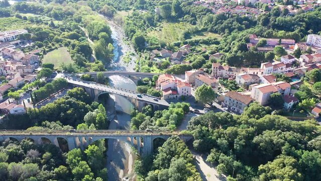 Flight over the city Ceret on summer day. France