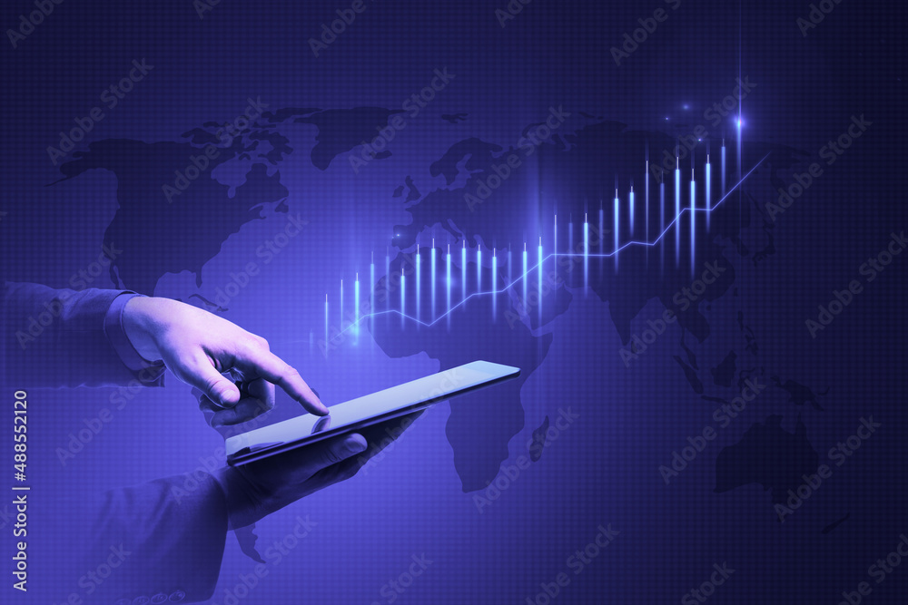 Poster close up of businessman hand pointing at tablet with absytract glowing business chart and map hologr