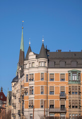 Old houses with a tower shaped as bay windows in the district Östermalm a sunny winter day in Stockholm