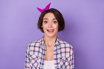 Photo of funky funny positive charming lady with pink headband lick lips flirting isolated on violet color background