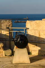 Birgu (Vittoriosa), Malta - February 9th 2019: Cannon on the Ferramolino’s cavalier at Fort Saint...