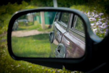 Photo of the car in the rearview mirror
