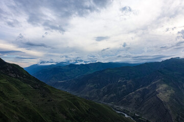 Naklejka premium Panoramic view of the mountains from the ancient village of Goor. Russia, Dagestan 2021