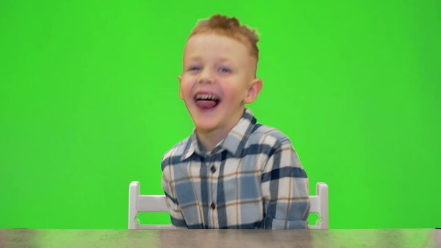 5 year old boy laughing and playing around, chromakey