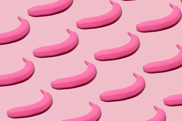 Pink painted bananas, hot pink pattern against pastel background. Summer vibes, exotic fruit, waves, flow, rhythm, pulse. 