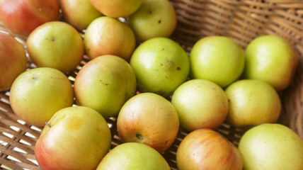 Some sweet Indian jujube kept in wooden pot at home in Dhaka, Bangladesh