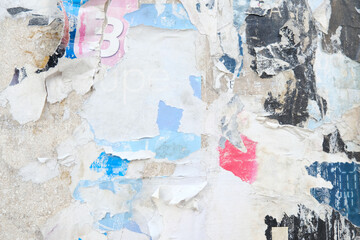 Ripped street poster background. Torn paper, abstract texture.  
